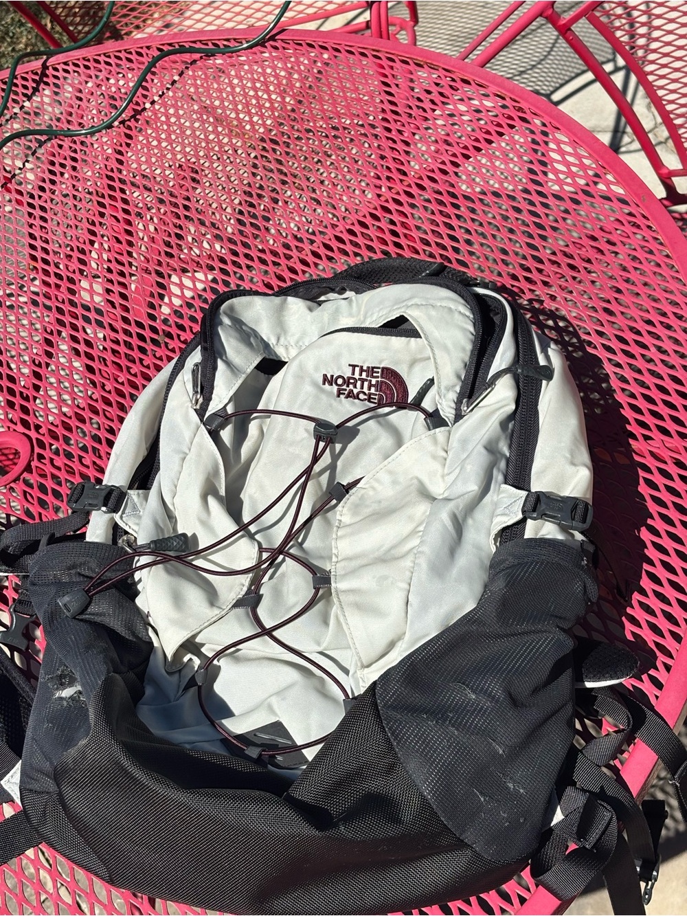 The North Face Black and White Daypack with Bungee Front